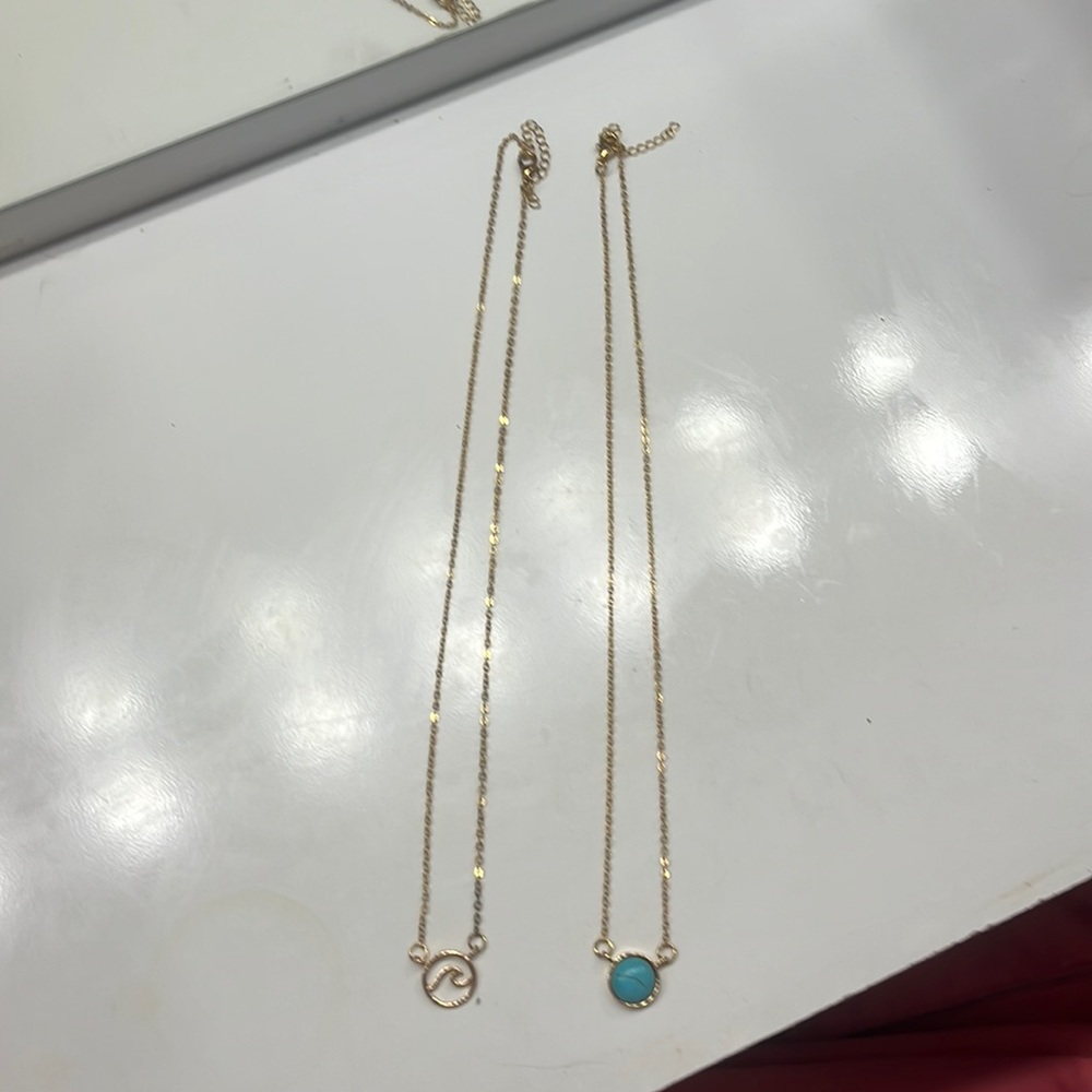 Pura Vida gold necklaces. Sold together.